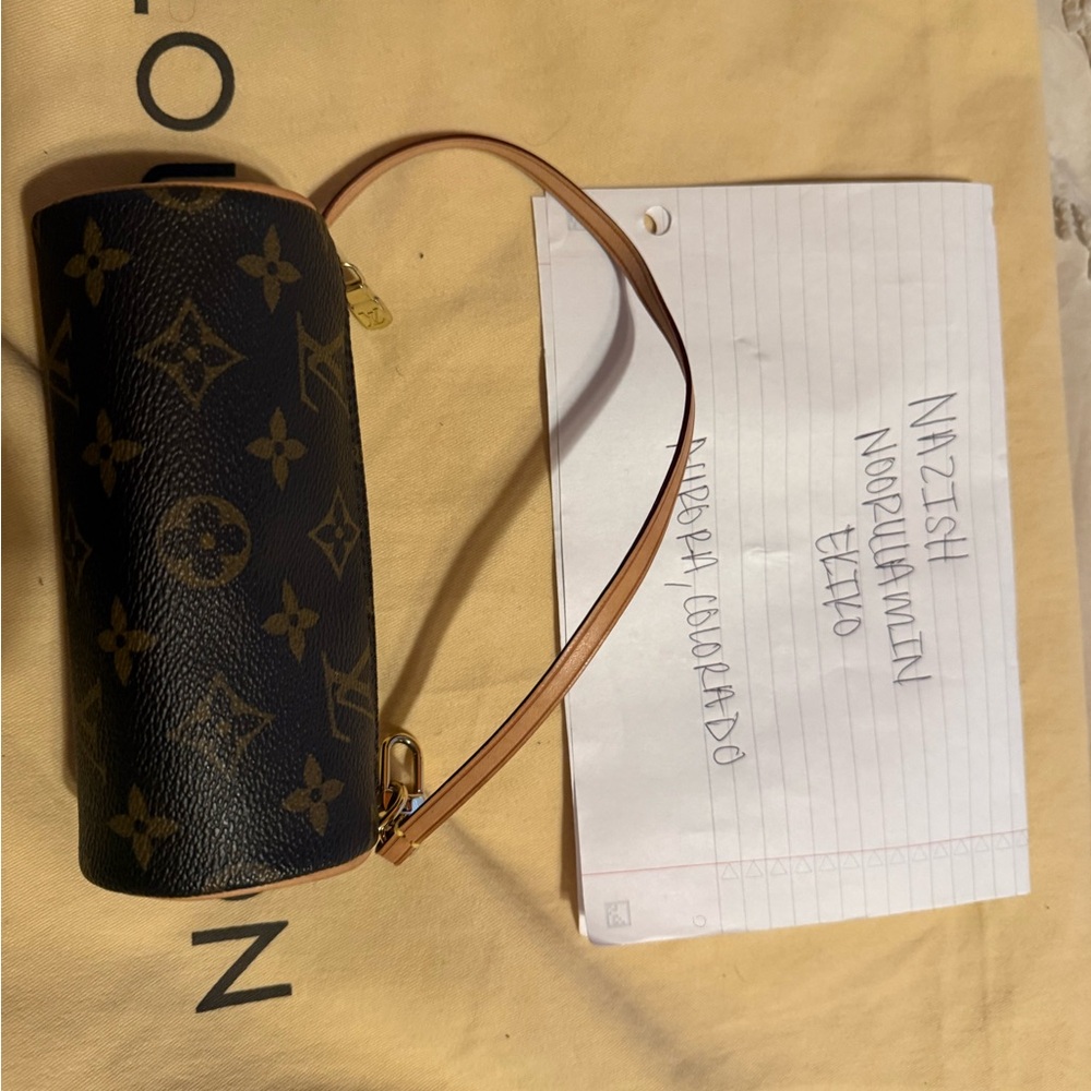 Louis Vuitton Black and Gold Monogram Cylinder accessory pouch!